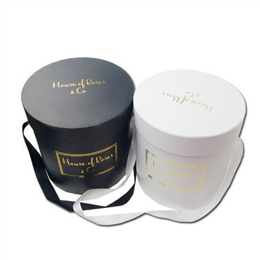 Okrogle škatle za rože kot darilni kompleti